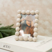 Retratera de Mármol