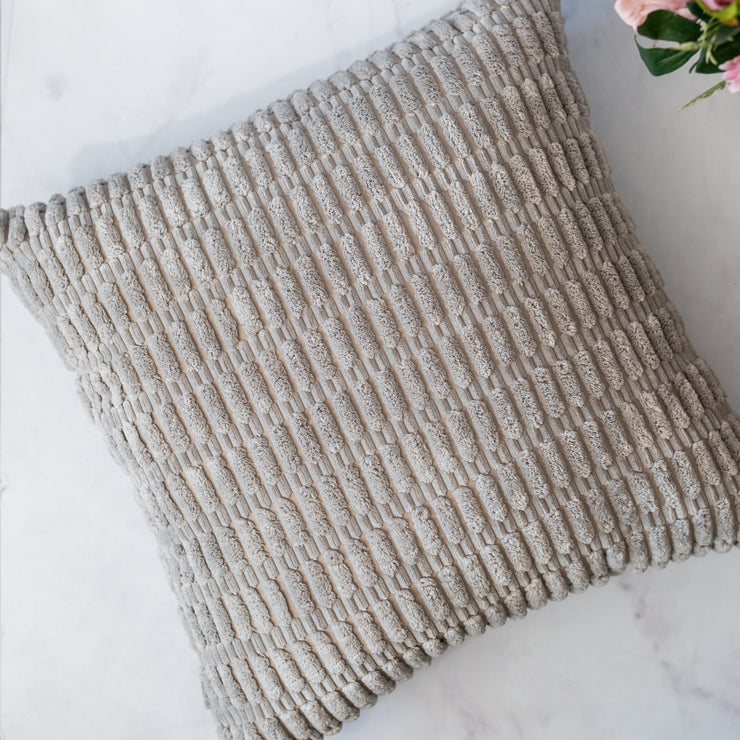 Cojin afelpado tonos grises - ambientihonduras